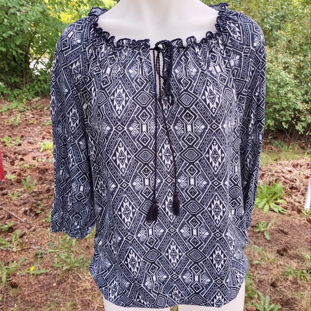 Navy and white patterned blouse